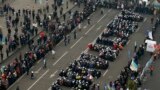 Pro-European integration protesters form the Ukranian word &quot;Lustration&quot; at Independence Square in Kyiv.