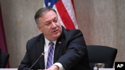 Secretary of State Mike Pompeo listens during the third annual U.S.-Qatar Strategic Dialogue at the State Dept., Monday, Sept. 14, 2020 in Washington. (Erin Scott/Pool via AP)