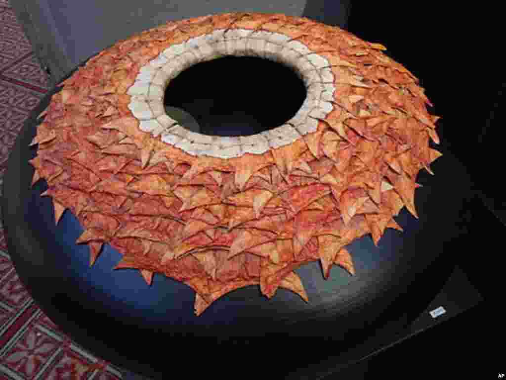 Pit Fired Ceramic Vase, overlaid with the natural leaf bases of the Dracaena Draco, the 'Dragon Tree,' by Christine Adcock of Santa Barbara, California.