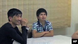 Afghan migrants Hafeez, Mohammed and Sahil [not pictured] are studying English at an evening class in Athens, Greece, June 2011