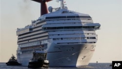 Carnival Triumph is towed into Mobile Bay Feb. 14, 2013