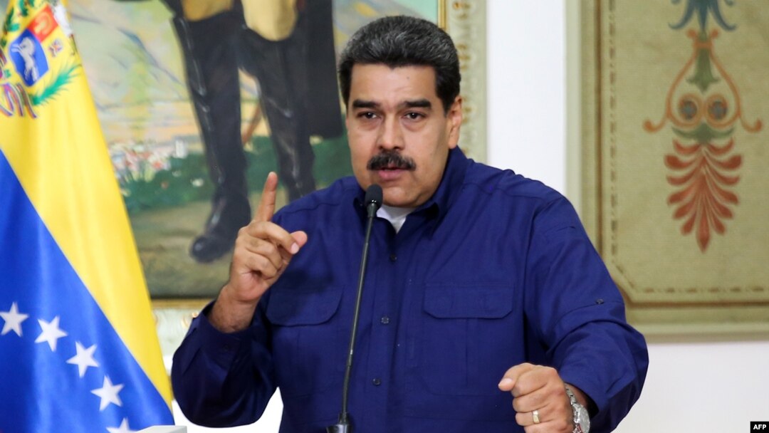 Handout picture released by the Venezuelan presidency showing Venezuelan President Nicolas Maduro speaking during a press conference at the Miraflores Presidential Palace in Caracas, Venezuela, March 11, 2019.