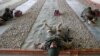 AFGHANISTAN -- Afghan National Army (ANA) soldiers take part in a training exercise at the Kabul Military Training Centre (KMTC) in Kabul, January 27, 2019