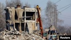 Разрушения после удара ВСУ Украины по российскому подразделению в Макеевке, Украина