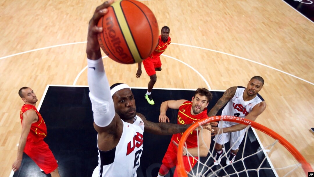 United States' LeBron James (6) dunks against Spain during the men's gold medal basketball game at the 2012 Summer Olympics in London on Sunday, Aug. 12, 2012. 