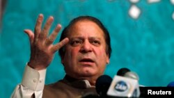 Nawaz Sharif speaks to party members during a function in Lahore in this May 20, 2013 file photo. 