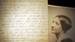 美國卡佩爾斯手稿圖書館展出的婦女投票權運動主要領袖蘇珊·安東尼照片和她1898年的手寫稿(2005年1月10日資料照片)
