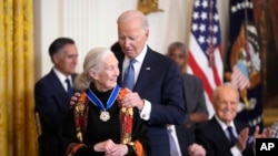 President Joe Biden, right, presents the Presidential Medal of Freedom, the nation's highest civilian honor, to conservationist Jane Goodall in the East Room of the White House in Washington, Jan. 4, 2025.