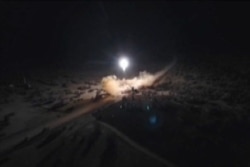 An image grab from video obtained from the state-run Iran Press news agency allegedly shows rockets launched by Iran against U.S. military bases in in Iraq, Jan. 8, 2020.