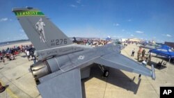 FILE - A Vermont-based F-16 Fighting Falcon is on display at the Great State of Maine Air Show, Saturday, Aug. 26, 2017, in Brun