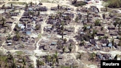 Buildings damaged during Cyclone Kenneth are seen from the air in a village north of Pemba, Mozambique, May 1, 2019. 