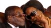 FILE: President Robert Mugabe and his wife Grace attend the burial of two independence luminaries, Maud Muzenda and George Rutanhire, in Harare, Zimbabwe August 26,2017. REUTERS/Philimon Bulawayo TPX IMAGES OF THE DAY - RTX3DGG4