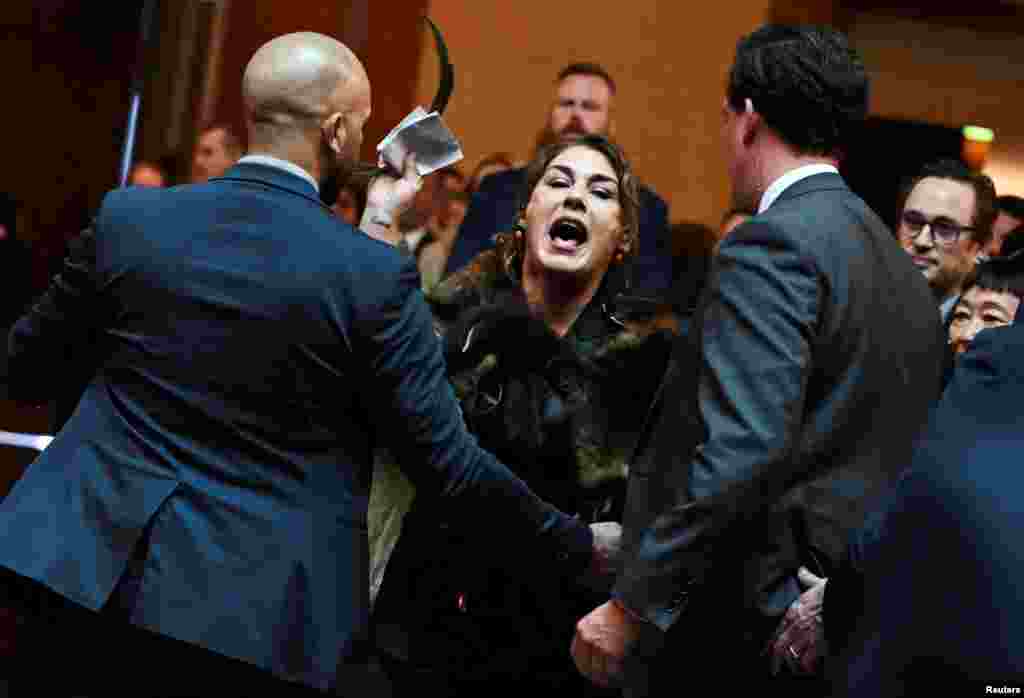 Australian Senator Lidia Thorpe stages a protest as Britain&#39;s King Charles and Queen Camilla attend a Parliamentary reception in Canberra.