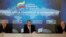 Venezuela's Vice President Tareck El Aissami, center, speaks during a meeting with bondholders and their representatives in Caracas, Nov. 13, 2017.