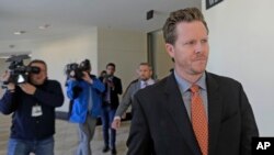 File - In this Nov. 15, 2019, file photo, Paul Petersen, an Arizona elected official accused of running a multi-state adoption scheme, leaves court following an initial appearance on charges filed in the state in Salt Lake City. 