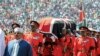 Kenyan military pallbearers carry the casket of former president Daniel arap Moi, draped in a Kenyan flag, at his state funeral in Nyayo Stadium, in Kenya's capital of Nairobi, Kenya, Feb. 11, 2020. 