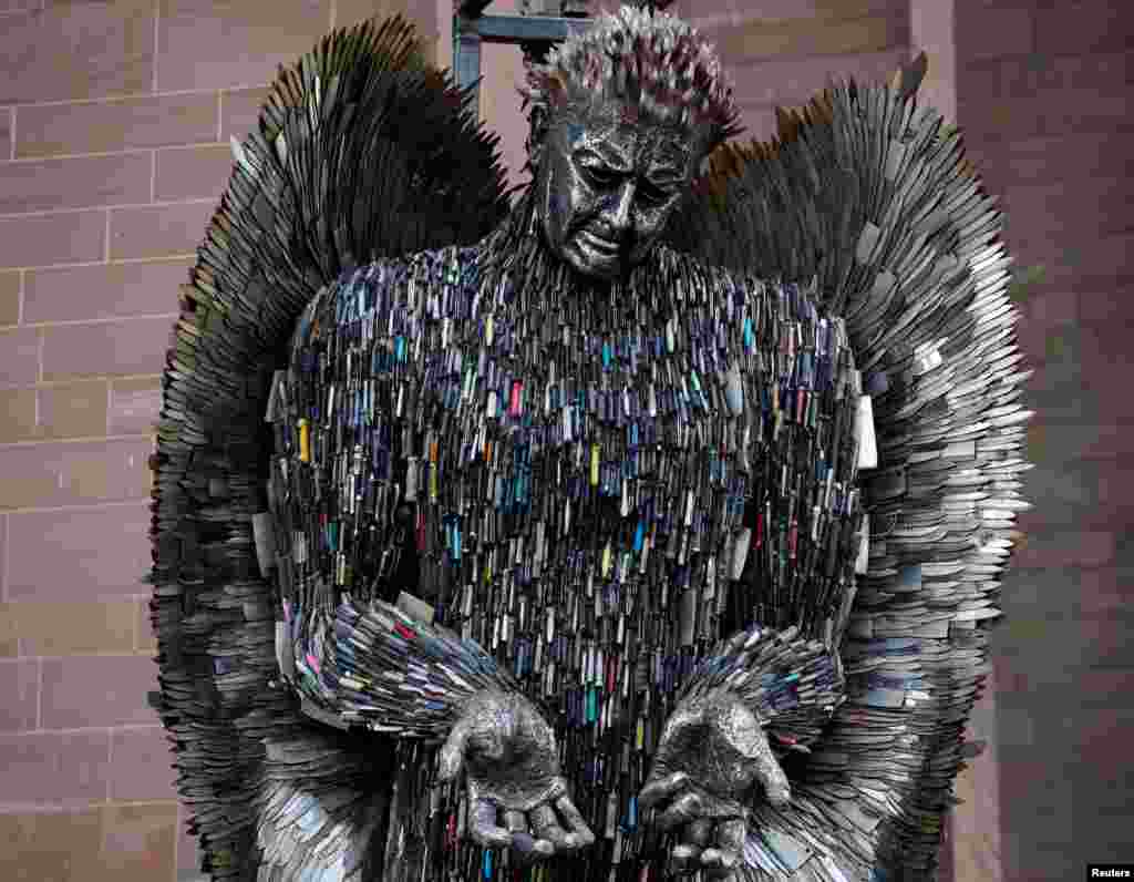 The &#39;Angel of Knives&#39; work by artist Alfie Bradley goes on display outside the Anglican Cathedral, in Liverpool, Britain. The piece is&nbsp;made from over 100,000 knives.