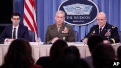 Marine Gen. Thomas D. Waldhauser, commander, U.S. Africa Command, center, with Assistant Secretary of Defense for International Security Affairs Robert S. Karem, left, and Army Maj. Gen. Roger L. Cloutier, right, chief of staff, U.S. Africa Command, and lead investigating officer, brief the media on the Niger ambush at the Pentagon, May 10, 2018. 
