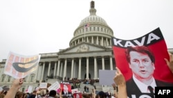 Les manifestants protestent contre la nomination de Brett Kavanaugh, candidat à la Cour suprême, à Washington DC, le 6 octobre 2018.