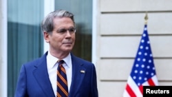 FILE PHOTO: U.S. Treasury Secretary Scott Bessent speaks to the media after two days of meetings with a Chinese delegation, in Paris