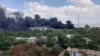 FILE - Smoke billows from the scene of an airstrike in Mekelle, capital of the Tigray region, Ethiopia, Oct. 20, 2021.