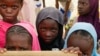 FILE: Displaced children attend class in Dori town, Burkina Faso, Aug. 7, 2021.