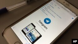 FILE - The messaging app Telegram is displayed on a smartphone, July 15, 2017.