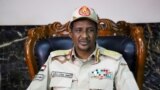 FILE - Sudan's Mohamed Hamdan Dagalo attends the signing of a peace and cease-fire agreement in Juba, South Sudan, Oct. 21, 2019.