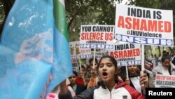 Members of National Students' Union of India (NSUI), the student wing of India's main opposition Congress party, shout slogans during a protest against the attacks on the students of Jawaharlal Nehru Universityon, in New Delhi, Jan 6, 2020.