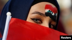 Soccer Football - World Cup 2022 Qualifier - Second Round - Group C - Iraq v Iran - Amman International Stadium, Amman, Jordan - November 14, 2019 An Iraq fan poses before the match