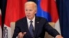 FILE - U.S. President Joe Biden speaks during a meeting with leaders of Japan and South Korea in Lima, Peru, Nov. 15, 2024. He will visit the African nations of Cabo Verde and Angola next week.