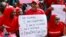 Women attend a demonstration calling on the government to rescue the kidnapped school girls of a government secondary school Chibok, outside the defense headquarters in Abuja, Nigeria, May 6, 2014. 