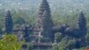 In this photo taken June 6, 2006, an overview of Angkor Wat temple tower, in Siem Reap province, the Cambodian main tourist destination in northwest of Phnom Penh, Cambodia. A replica of Cambodia's iconic 12th century Angkor Wat temple is being built on the banks of the Ganges River in eastern India. (AP Photo/Heng Sinith)