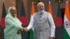 Bangladeshi Prime Minister Sheikh Hasina shakes hands with Indian Prime Minister Narendra Modi before their meeting in New Delhi on June 22, 2024. Hasina is on a two-day state visit to India.