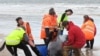 Australia Races To Rescue Beached Whales 