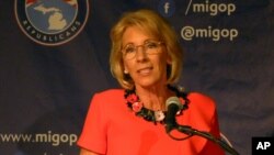 FILE - Education Secretary Betsy DeVos speaks on Friday, Sept. 22, 2017 at the Mackinac Republican Leadership Conference on Mackinac Island, Mich.