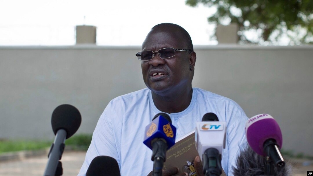 FILE - A July 26, 2013 photo shows former South Sudan VP Riek Machar speaking to the media to announce he will run for the presidency in 2015 against President Salva Kiir.