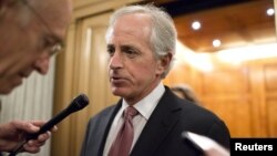 Senator Bob Corker (R-TN) speaks with reporters after a vote on Capitol Hill in Washington December 17, 2012.