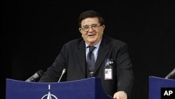 Afghan Defense Minister Abdul Rahim Wardak holds a news conference after a meeting of NATO Foreign Ministers with non-ISAF contributing nations in Brussels, April 19, 2012.