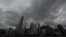 FILE - Awan tebal menyelimuti distrik Central Hong Kong, saat topan Koinu melintas di pusat keuangan tersebut, tengah hari 8 Oktober 2023. Pemimpin kota Hong Kong mengumumkan bursa saham akan terus melanjutkan perdagangan meski akan terjadi topan dan badai. (Peter PARKS / AFP)