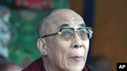 Tibetan spiritual leader the Dalai Lama looks on during the commemoration of the anniversary of the 1959 Tibetan uprising against Chinese rule, in Dharmsala, India, March 10, 2011