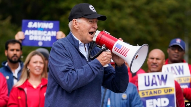 FILE - President Joe Biden joins striking United Auto Workers on the picket line, Sept. 26, 2023, in Van Buren Township, Mich. Michigan Democrats have warned that Biden’s response to the Israel-Hamas war could put his reelection in jeopardy in the key swing state next year.