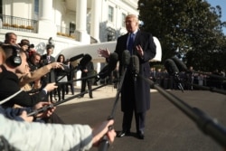 President Donald Trump speaks to reporters on the South Lawn of the White House in Washington, Nov. 8, 2019.