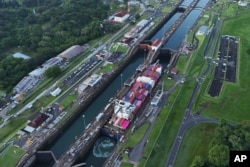 A cargo vessel  traverses the Agua Clara Locks of the Panama Canal successful  Colon, Panama, Sept. 2, 2024.