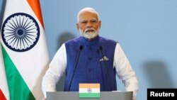 FILE - Indian Prime Minister Narendra Modi attends a press conference with Polish Prime Minister Donald Tusk (not pictured) at the Chancellery of the Prime Minister in Warsaw, Poland, Aug. 22, 2024.