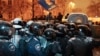 Riot police gather to remove a barricade set up by supporters of EU integration in Kyiv, Dec. 9, 2013. 