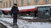 A police officer stands guard at the scene of the cafe explosion in which Russian military blogger Vladlen Tatarsky, (real name Maxim Fomin) was killed the day before in Saint Petersburg, Russia April 3, 2023. 