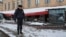 A police officer stands guard at the scene of the cafe explosion in which Russian military blogger Vladlen Tatarsky, (real name Maxim Fomin) was killed the day before in Saint Petersburg, Russia April 3, 2023. 