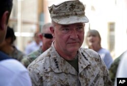 FILE - Marine Gen. Frank McKenzie, the head of U.S. Central Command, attends a ceremony at Resolute Support headquarters, in Kabul, Afghanistan, July 12, 2021.