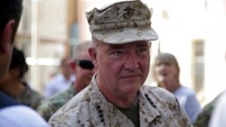 Marine Gen. Frank McKenzie, the head of U.S. Central Command, attends a ceremony where Gen. Scott Miller, not pictured, handed over command, at Resolute Support headquarters, in Kabul, Afghanistan, July 12, 2021.